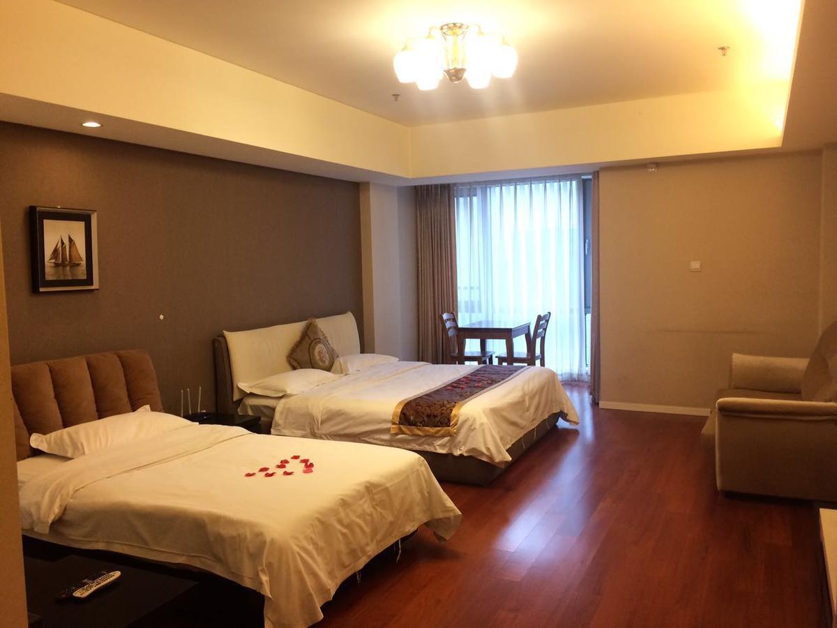 Jiu Du Hui Serviced Apartment Pekín Exterior foto