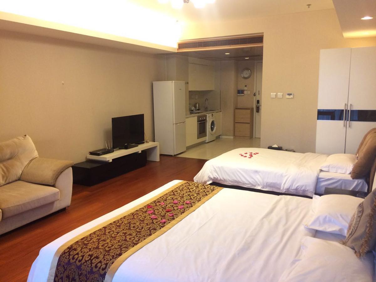 Jiu Du Hui Serviced Apartment Pekín Exterior foto